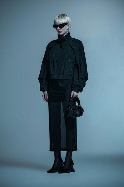 Loose turtleneck coat with curved sleeves