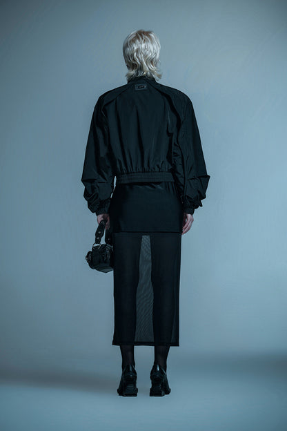 Loose turtleneck coat with curved sleeves